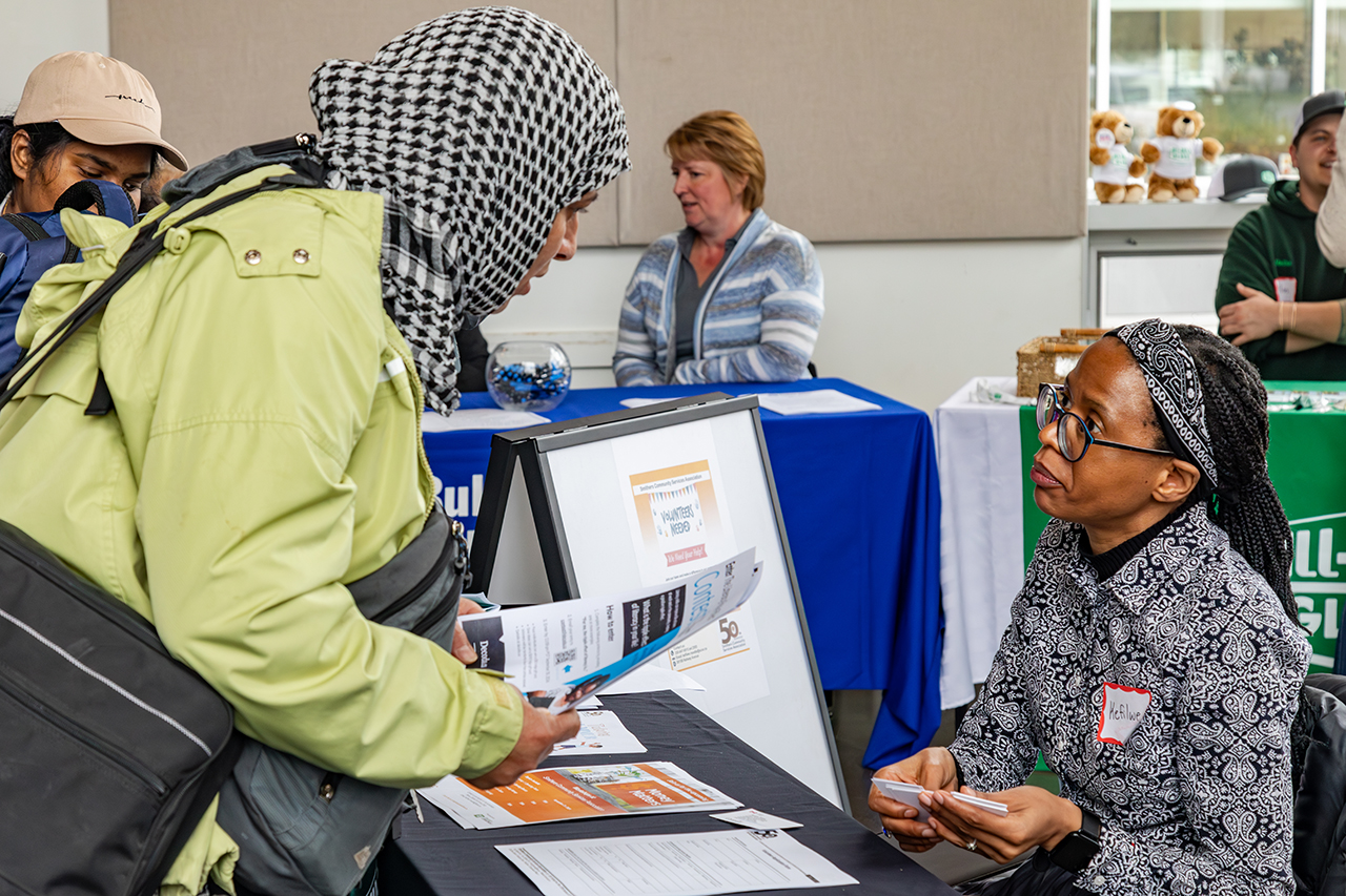 A Student Talks with an Employer at the Fair