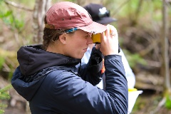 A student of the Field School takes measurements.